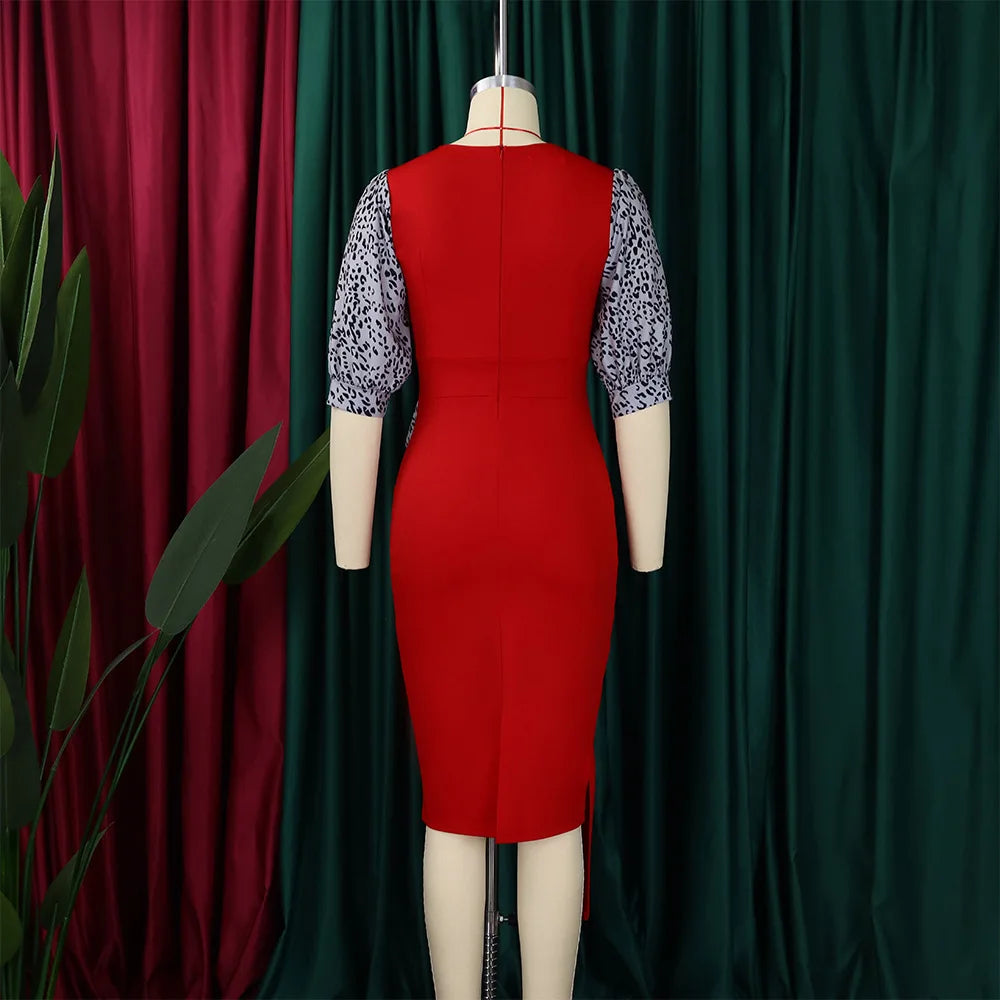 Elegant Midi Dress with Statement Sleeves