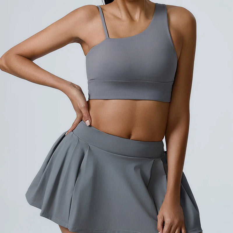 Asymmetric Sports Bra & Pleated Skirt Set
